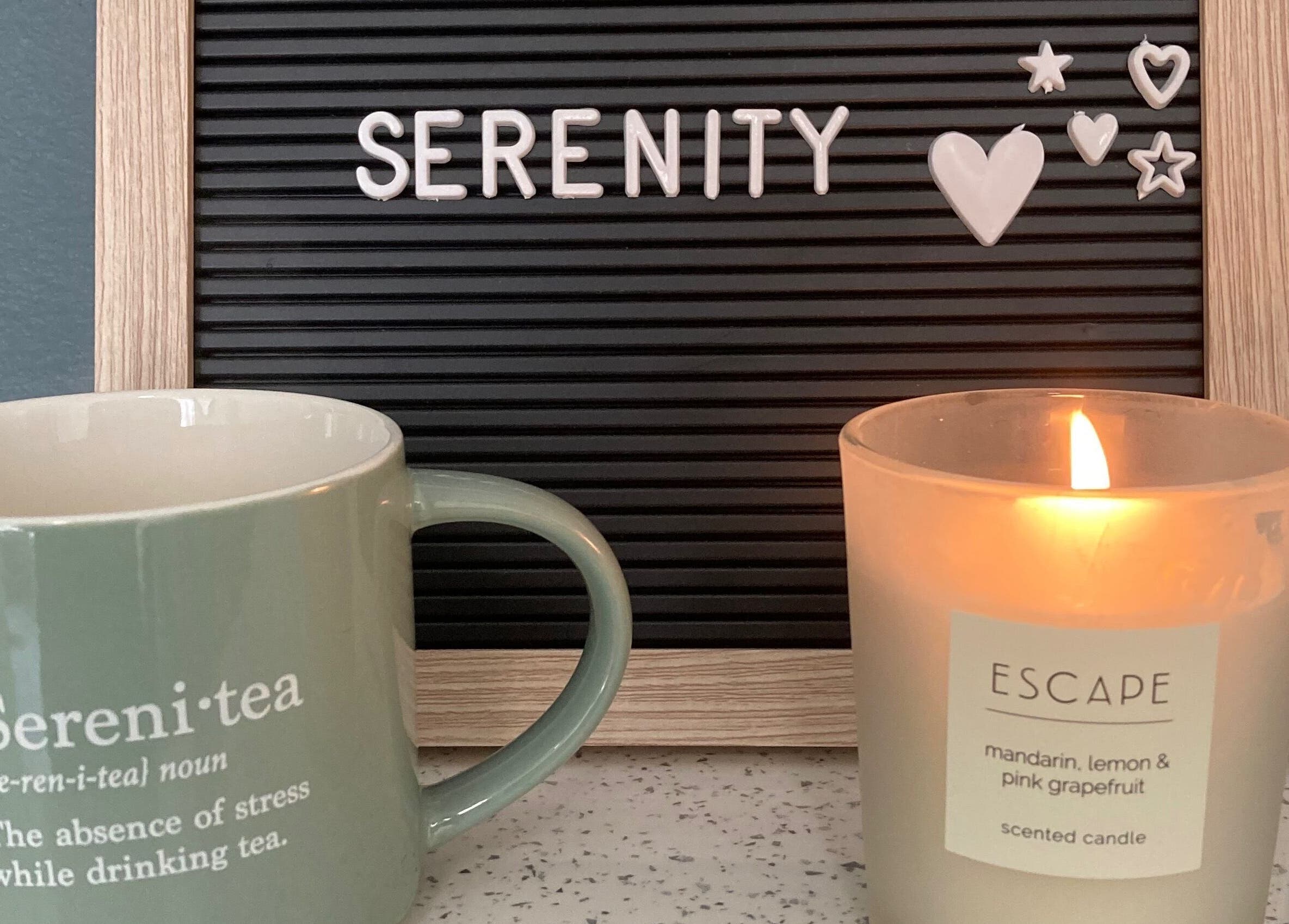 Relaxing atmosphere at Bliss & Beauty by Nikki at Serenity, Leek, England, GB, featuring candle and tea.