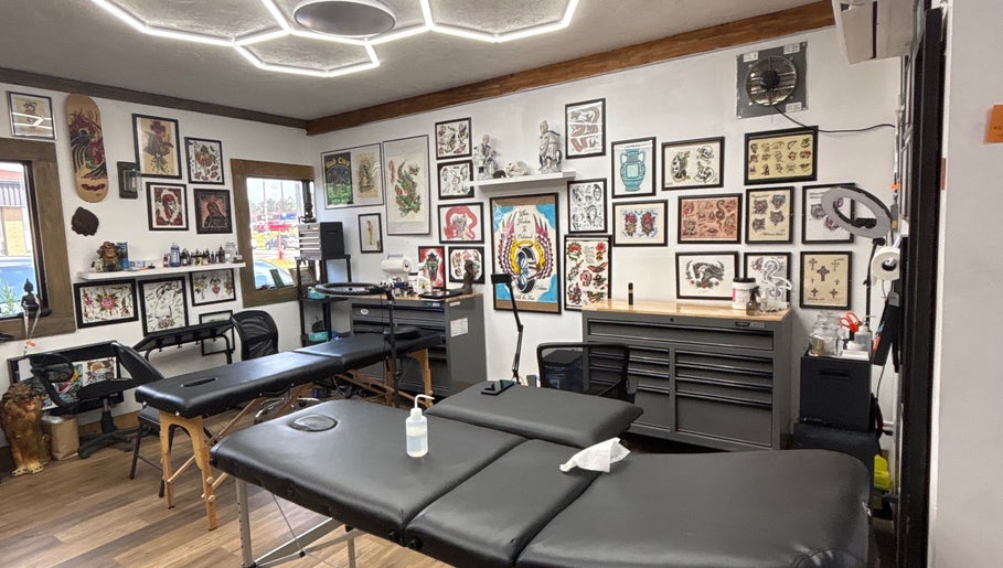Sierra’s Tattoos studio room in Moncton, New Brunswick, CA with tattoo art displays and workstations.