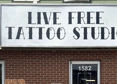 Live Free Tattoo Studio front sign near Sierra’s Tattoos, Moncton, New Brunswick, CA.