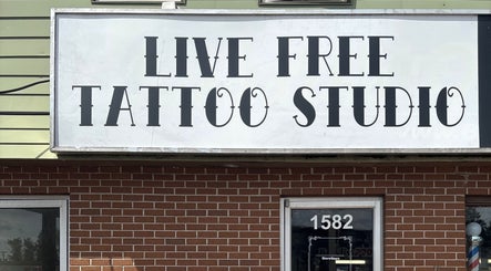 Live Free Tattoo Studio front sign near Sierra’s Tattoos, Moncton, New Brunswick, CA.