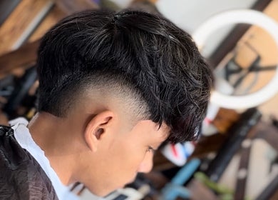 Stylish fade haircut at BARBER CFS, located in Gambang, Pahang, MY. Professional grooming for trendy looks.