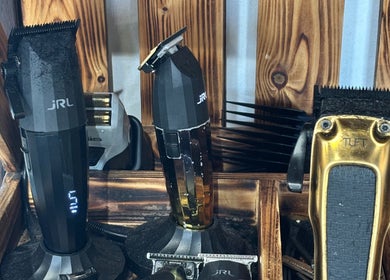 Professional clippers setup at BARBER CFS in Gambang, Pahang, MY showcasing premium grooming tools.