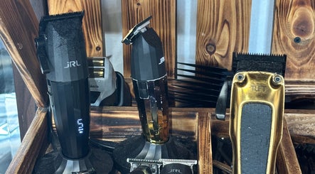 Professional clippers setup at BARBER CFS in Gambang, Pahang, MY showcasing premium grooming tools.