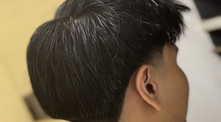 Close-up of a sleek haircut at BARBER CFS, Gambang, Pahang, MY showcasing expert styling.