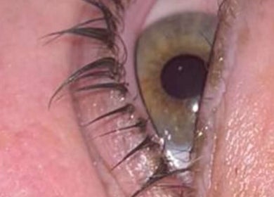 Closeup of eye with enhanced lashes at TheBeautyHut, Atherton, England, GB.