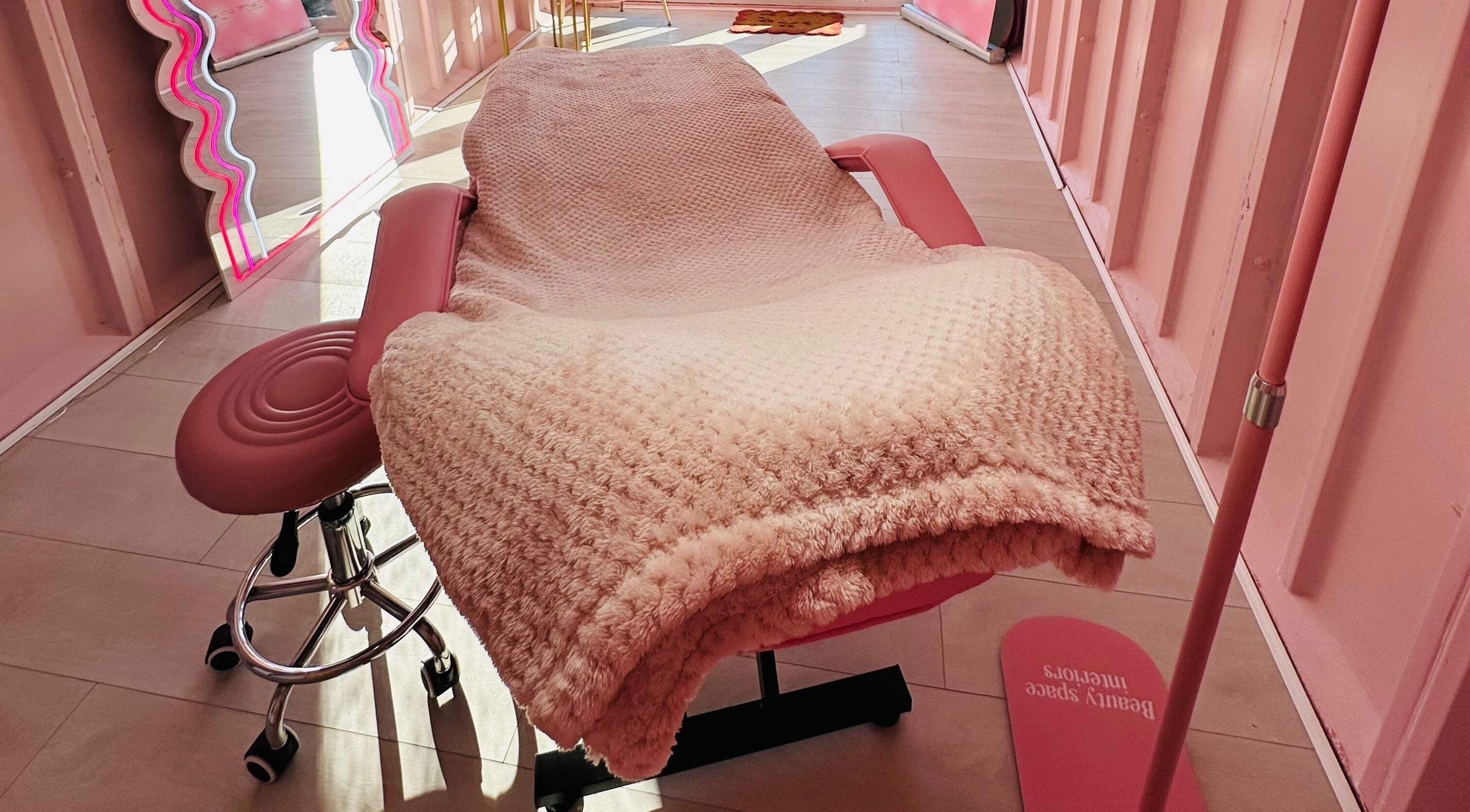 Luxurious pink treatment room at Doll Beauty Aesthetics & Training Academy, Cleeve, England, GB.