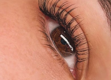 Close-up of enhanced eyelashes, showcasing beauty services at NC Beauty Bar, LLC, Milwaukee, Wisconsin, US.