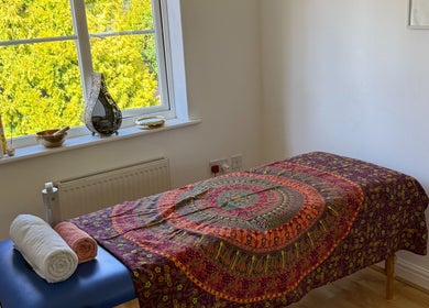 Relaxing massage room with vibrant decor at Healing Hands, Spalding, England, GB. Perfect for wellness escapes.