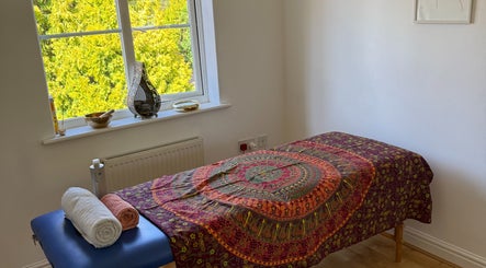 Relaxing massage room with vibrant decor at Healing Hands, Spalding, England, GB. Perfect for wellness escapes.