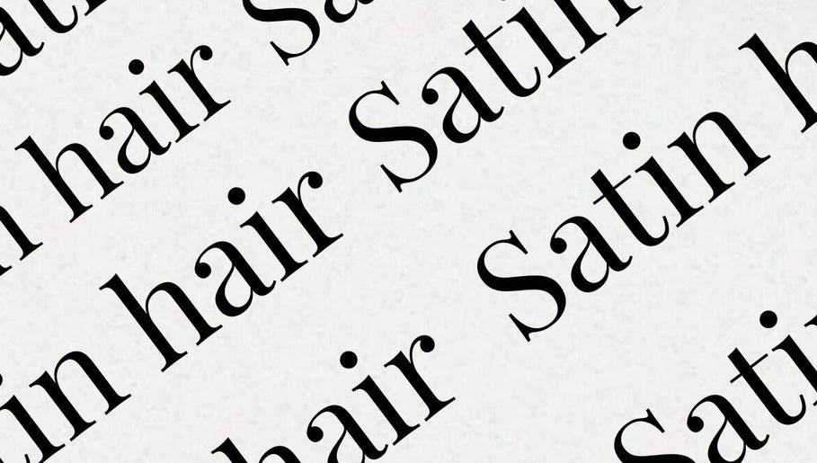 Repetitive script of 'Satin hair' showcasing Satinhairldn branding in London, England, GB.