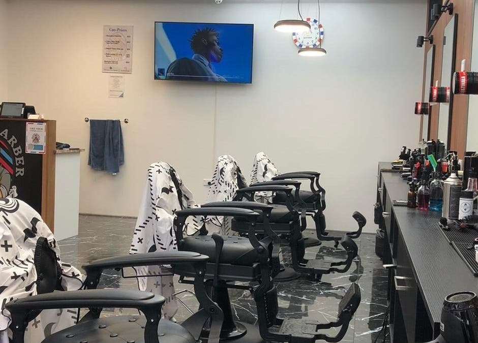 Modern interior of Fresh barber cuts in Christchurch, Canterbury Region, NZ with stylish barber chairs.