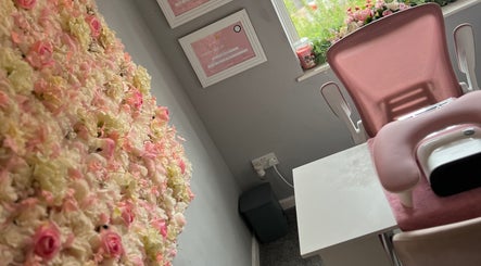 Elegant floral wall and beauty setup at Dolled by D.X, Rotherham, England, GB.