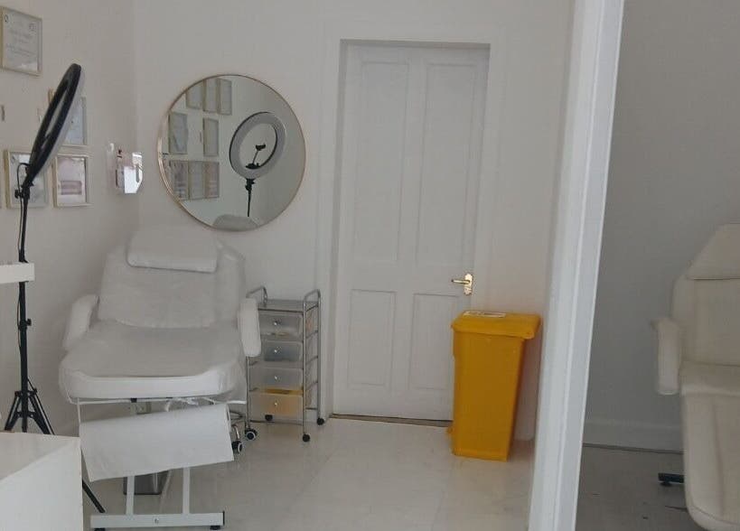 Professional treatment room at InnerGlow Aesthetics in Edinburgh, Scotland, GB, featuring modern equipment.