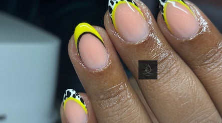 Yellow and black nail art at Beauty Garden by Botshelo, Rustenburg, North West, ZA.