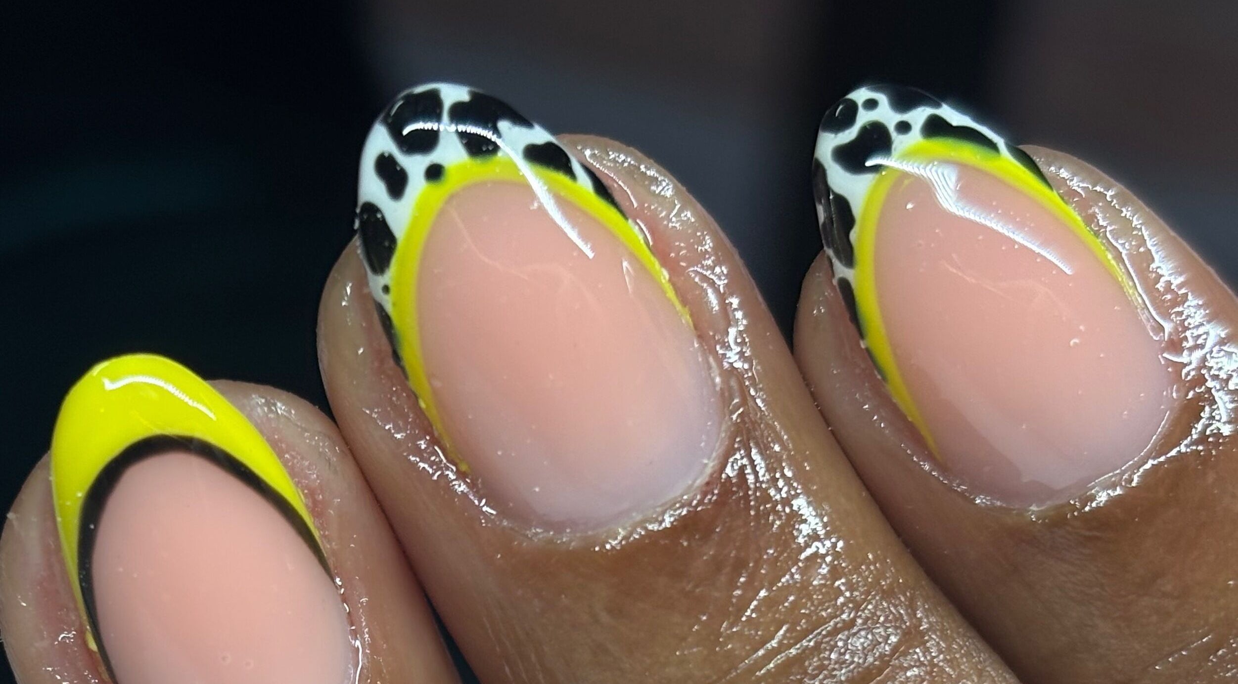 Stylish nail art with yellow and black design at Beauty Garden by Botshelo, Rustenburg, North West, ZA.