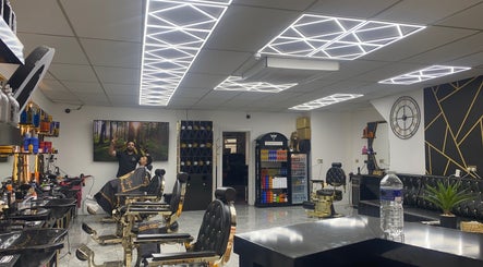 Modern interior of Sean’s Chair salon in Sheerness, England, GB, featuring stylish decor and barber chairs.