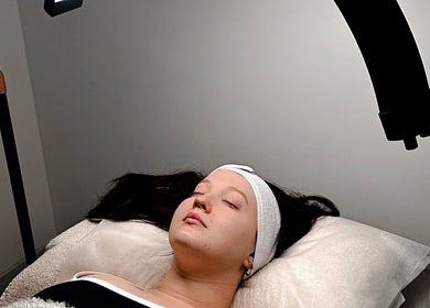 Relaxing facial session at The Derm Lounge, Woody Point, Queensland, AU, promoting rejuvenation and tranquility.
