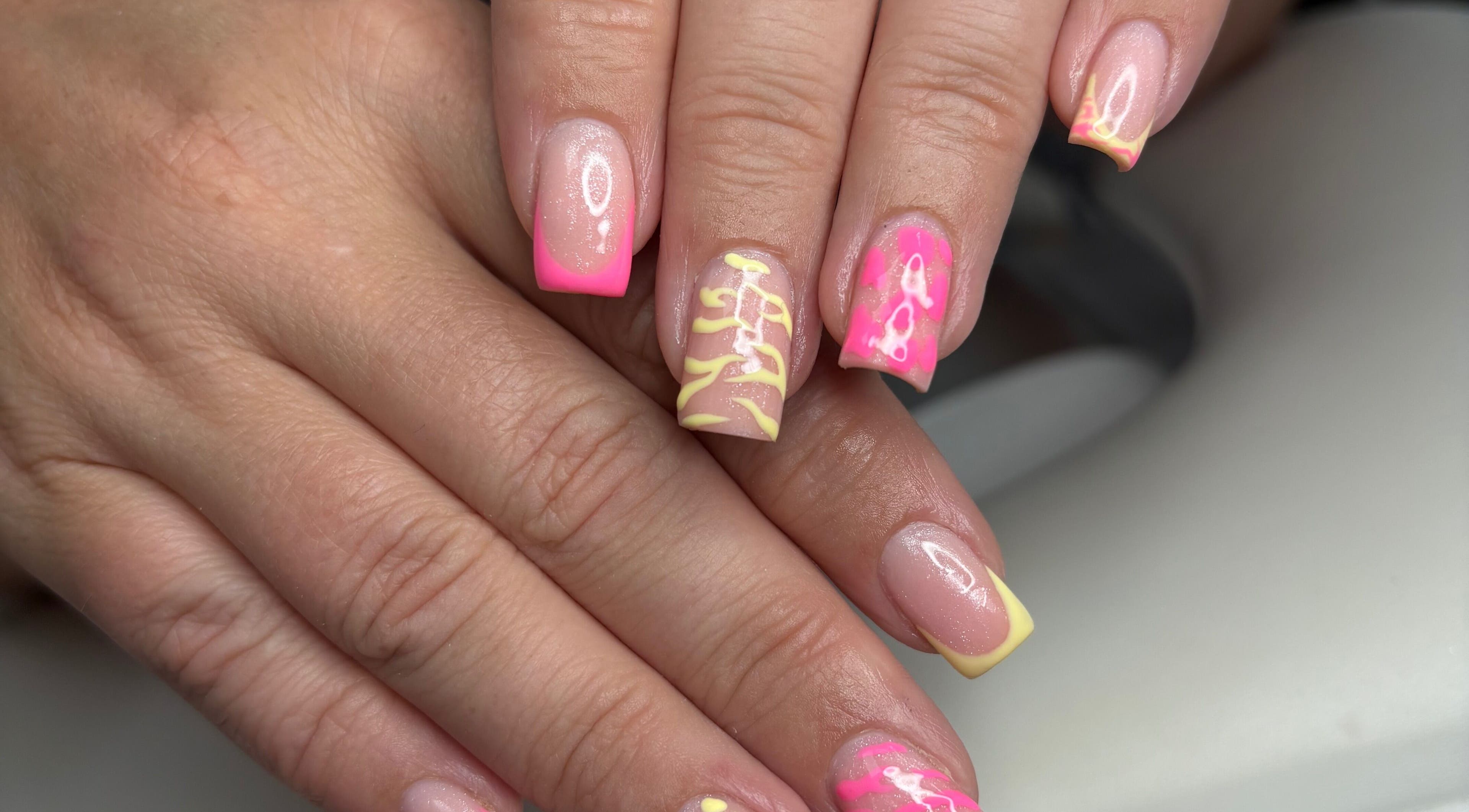 Vibrant neon nail art at TILLYnailedit, Chadderton, England, GB. Bright colors and intricate designs.