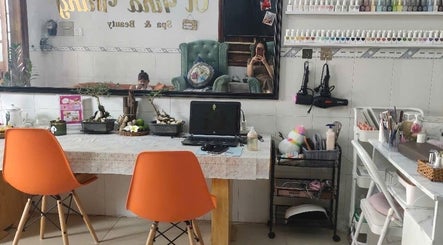Interior of Oi Nha Trang Spa in Nha Trang, Khánh Hòa, VN featuring a manicure station with vibrant decor.