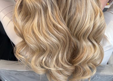 Luxurious blonde waves styled at Levre Beauty, London, England, GB.