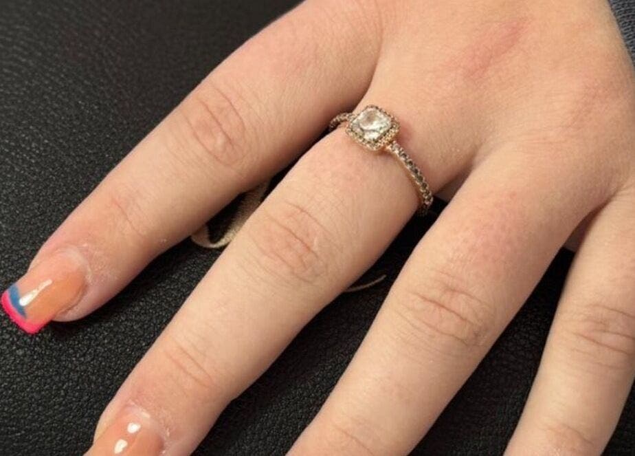 Colorful manicured nails with a ring at Niamh&Co, Stanford-le-Hope, England, GB.