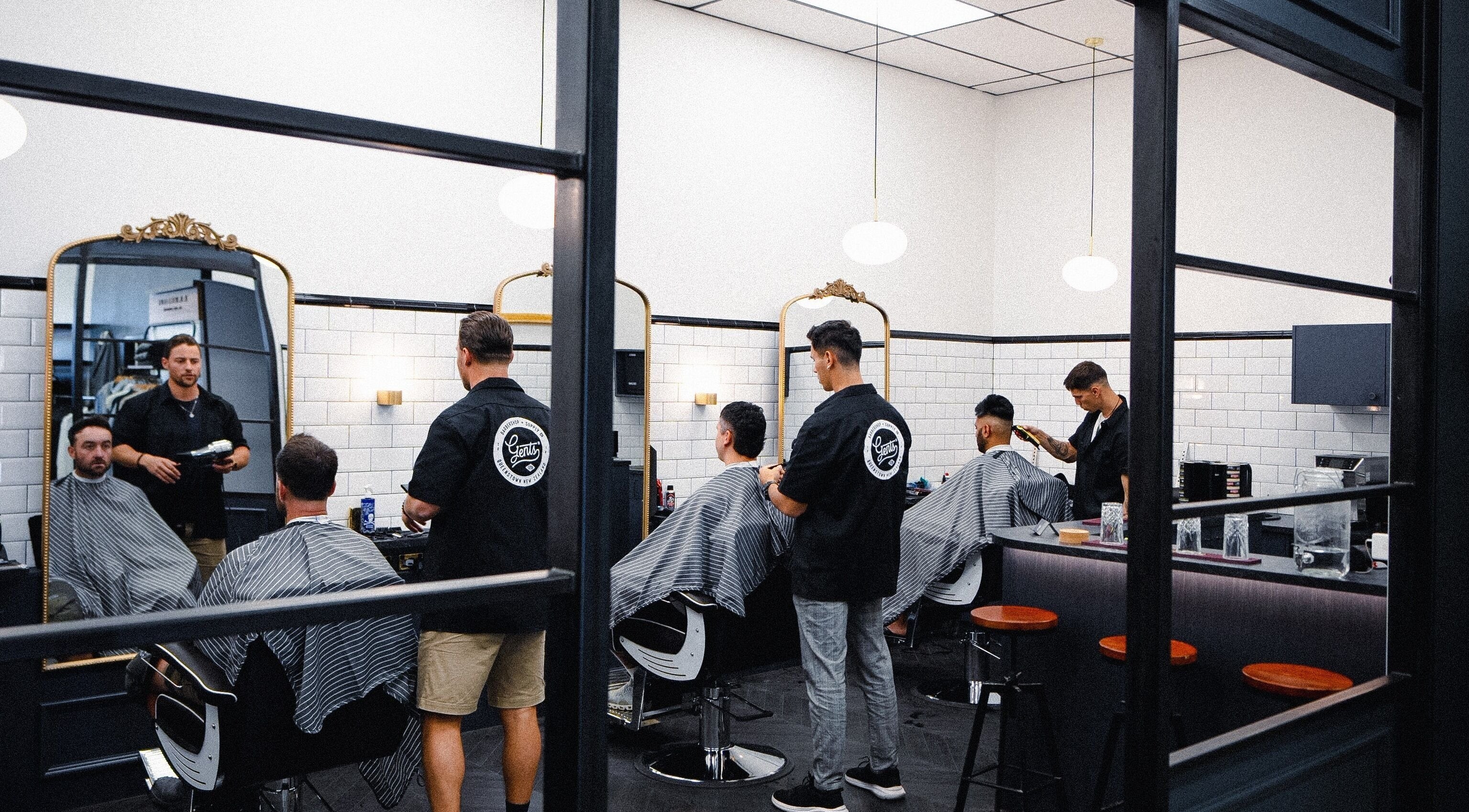 Barbers working at Gents Barber Shop Frankton (Mr. Davis), Queenstown, Otago Region, NZ, providing fresh haircuts.