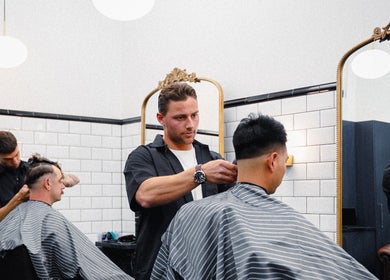 Barbers expertly cut hair at Gents Barber Shop Frankton (Mr. Davis) in Queenstown, Otago Region, NZ.