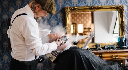 Vintage shaving service at Gents Barber Shop Queenstown, Queenstown, Otago Region, NZ with steaming technique.