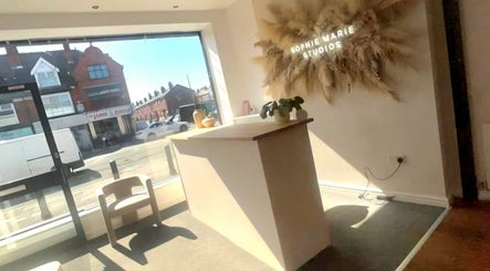 Inviting reception at Hindle Luxx Aesthetics, Manchester with bright decor and natural light.