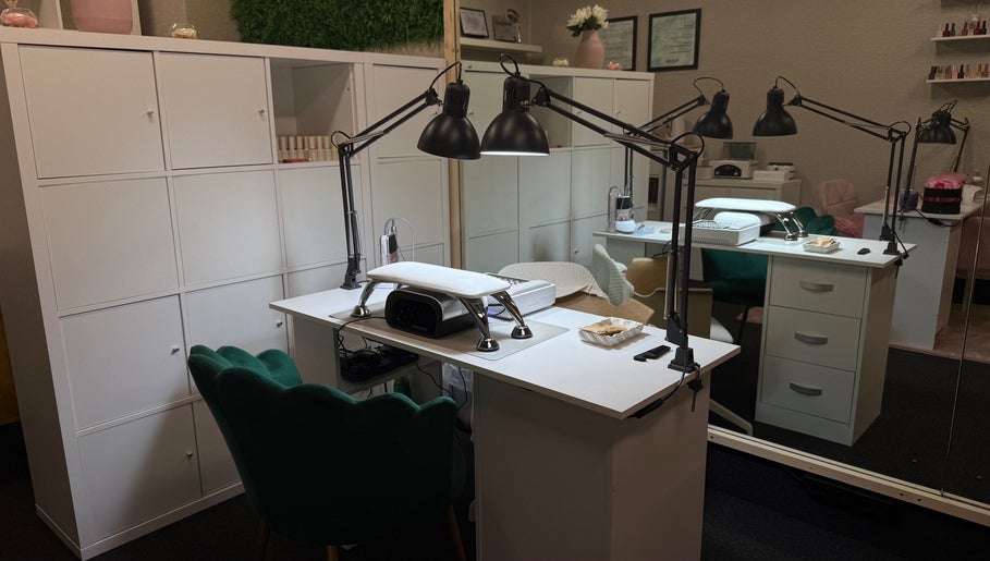 Modern nail station at Lustrée Nails, Northampton, England, GB, with elegant decor and professional equipment.