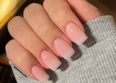 Elegant glossy pink nails at Lustrée Nails, Northampton, England, GB, showcasing premium manicure expertise.
