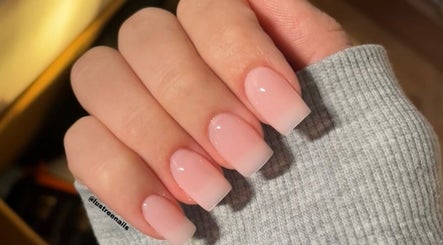 Elegant glossy pink nails at Lustrée Nails, Northampton, England, GB, showcasing premium manicure expertise.