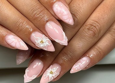 Beautiful floral nail art at Lustrée Nails, Northampton, England, GB showcasing intricate petal details.