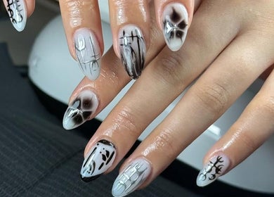Black and white artistic nail design at Lustrée Nails, Northampton, England, GB.