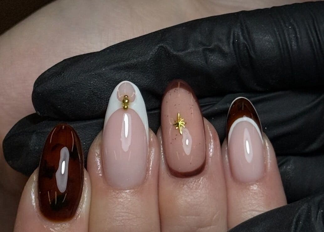 Chic nail art with brown and gold accents at Lustrée Nails, Northampton, England, GB.
