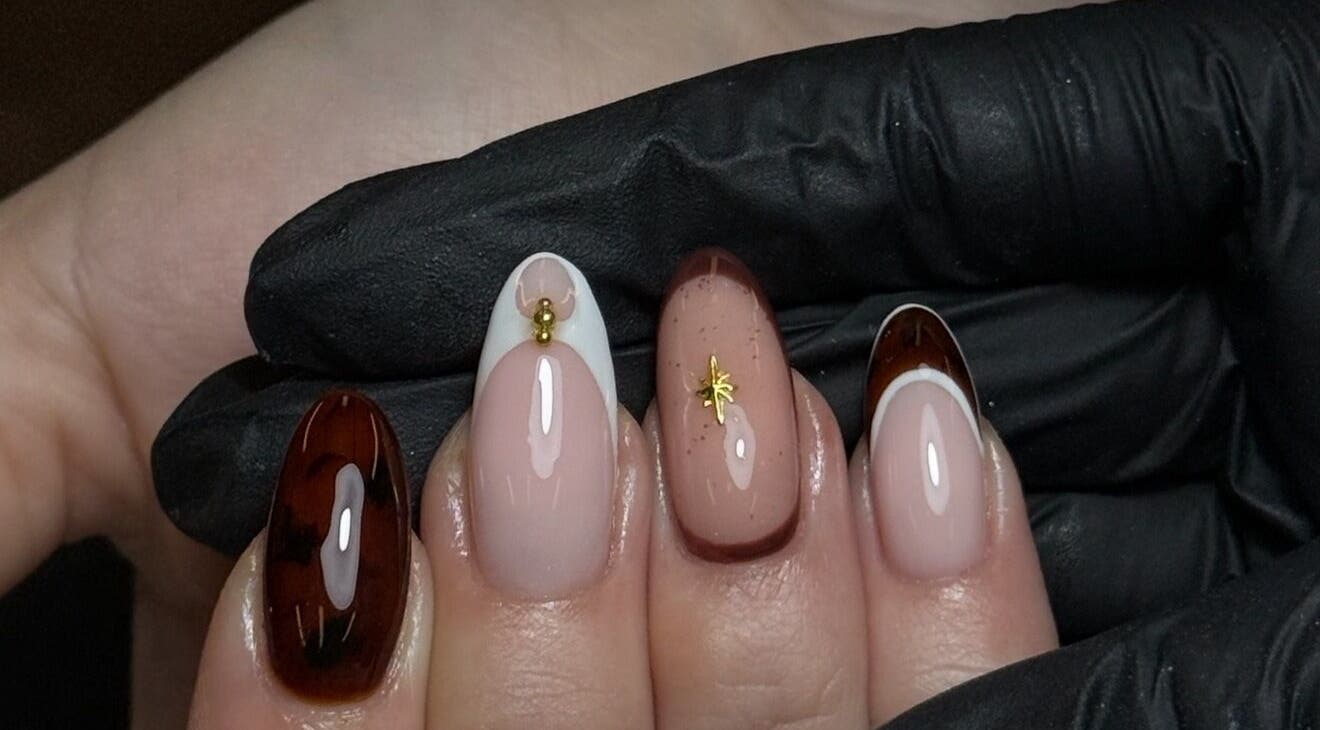 Chic nail art with brown and gold accents at Lustrée Nails, Northampton, England, GB.