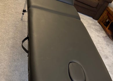 Luxurious massage couch at Powerful Aesthetics, Great Sankey, England, GB, perfect for relaxation and comfort.