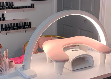 Nail station at Lash and Nail Allure, St. John's, Newfoundland And Labrador, CA, featuring a modern gel lamp.