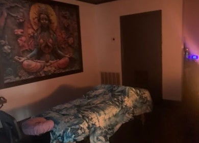 Relaxing massage room at Salt Spa II, Newport, Tennessee, US with serene decor and dim lighting.