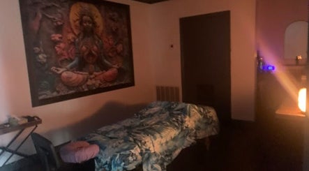 Relaxing massage room at Salt Spa II, Newport, Tennessee, US with serene decor and dim lighting.