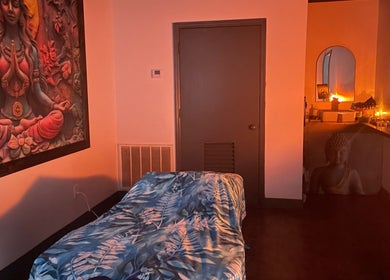 Tranquil massage room at Salt Spa II, Newport, Tennessee, US, with serene decor and warm lighting.