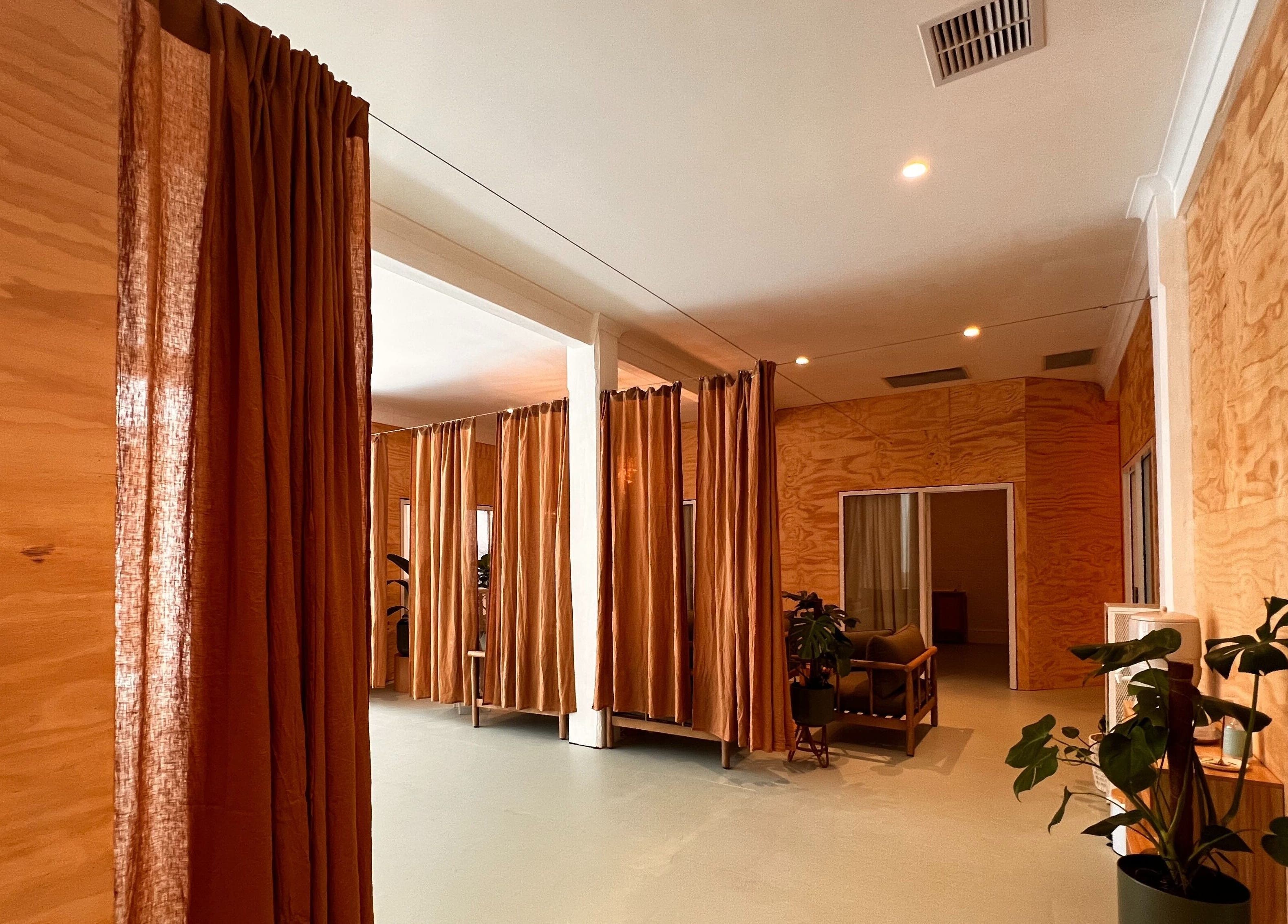 Warm, inviting interior of Jing By Archer - Fremantle, Western Australia, AU with soft lighting and wooden accents.