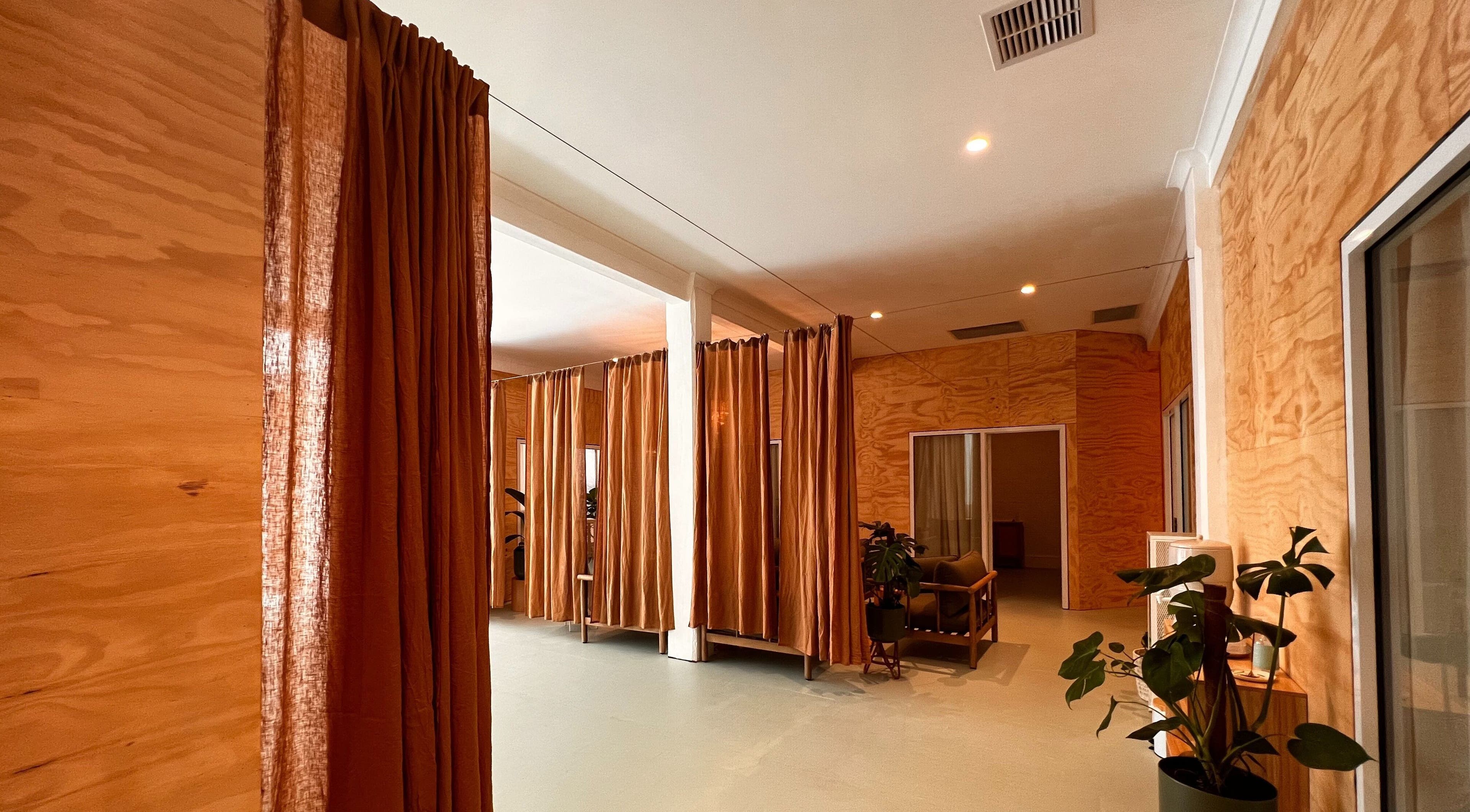 Warm, inviting interior of Jing By Archer - Fremantle, Western Australia, AU with soft lighting and wooden accents.