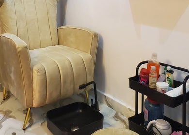 Luxury pedicure chair and product shelf at Amethyst Aura Med Spa, Ikeja, Lagos, NG.