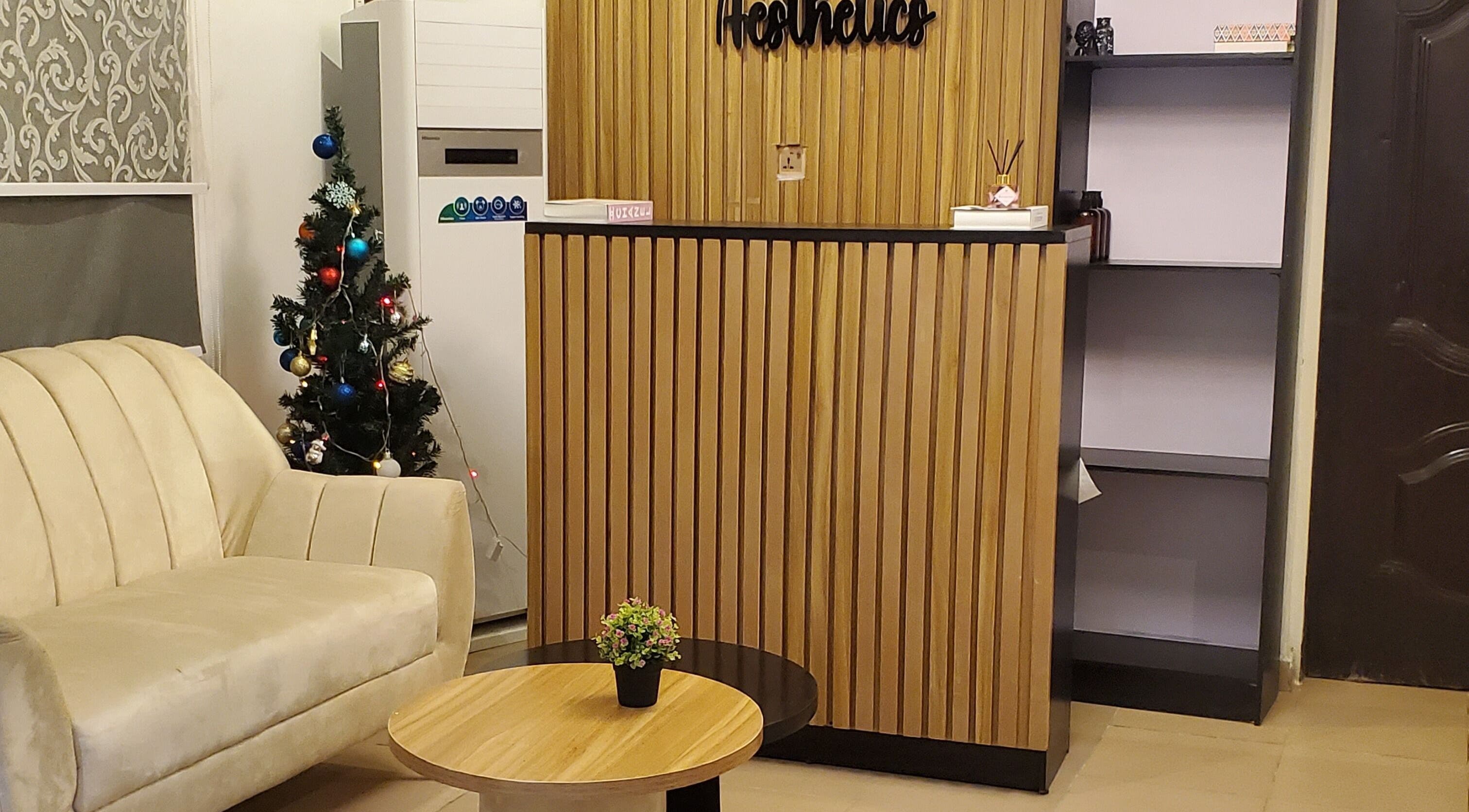 Reception area at Amethyst Aura Aesthetics Spa in Ikeja, Lagos, NG features elegant decor with plush seating.