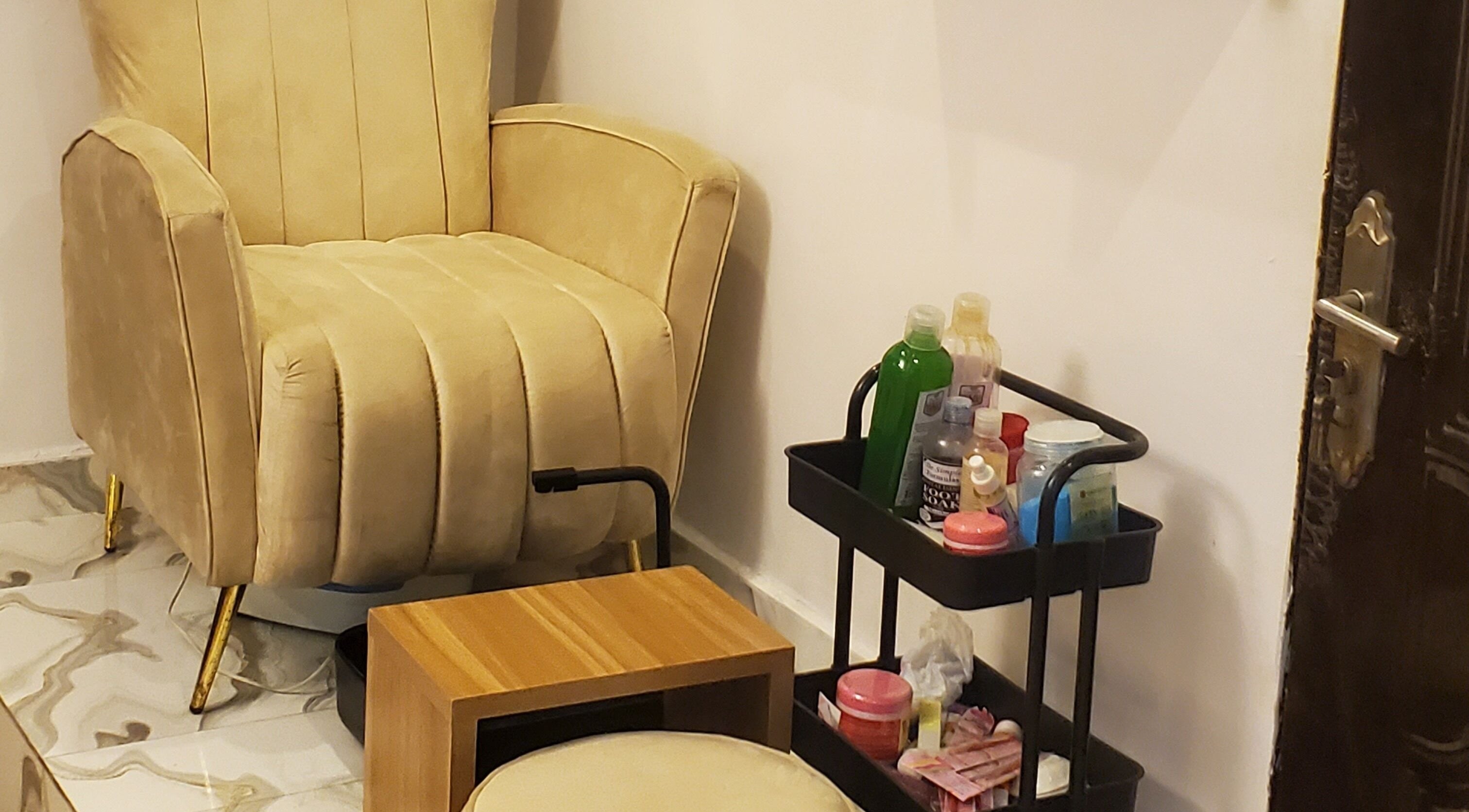 Comfortable chair and beauty cart at Amethyst Aura Aesthetics Spa, Ikeja, Lagos, NG.