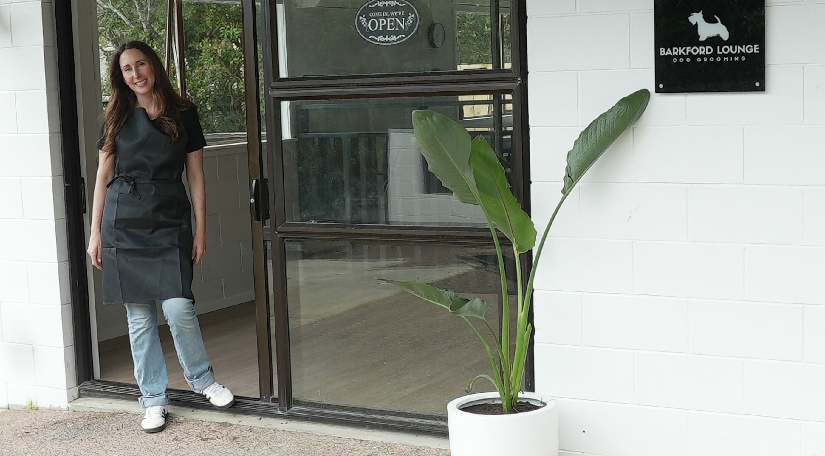 Barkford Lounge entrance in Auckland, NZ, with smiling staff ready to greet clients.