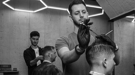 Barber performing haircut at Gent & Rascals Barbershop - Britomart Store, Auckland, NZ.