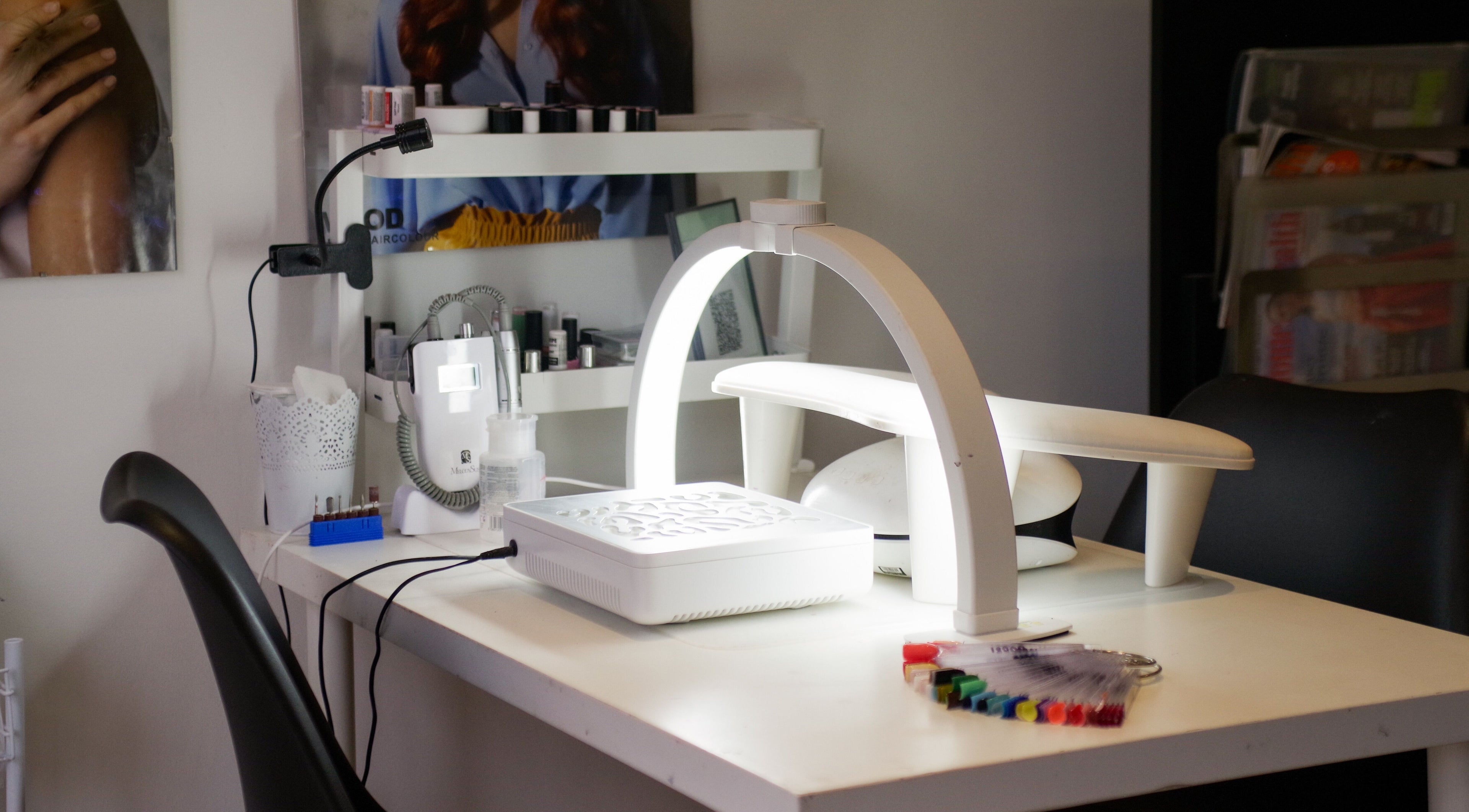 Mani Care nail station in Waterloo, England, GB showcasing tools and polishes for beauty treatments.