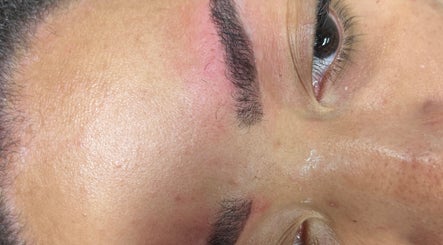 Eyebrow close-up showcasing precise grooming at Glamour & Grace in Bedford, Ohio, US.